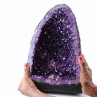 Amethyst geode with calcite crystal