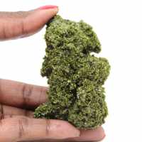 Epidote crystals from Morocco on beige matrix