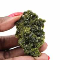 Small epidote on a light matrix from Morocco