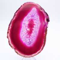 Polished slice of dyed pink agate
