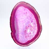 Decorative slice of dyed pink agate