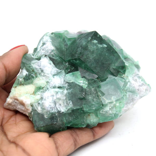 Raw green fluorite in crystals on matrix