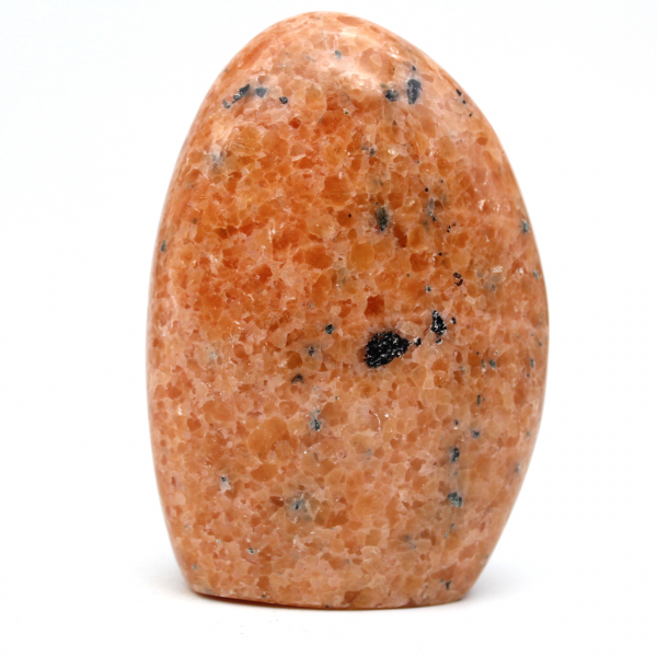 Orange calcite paperweight