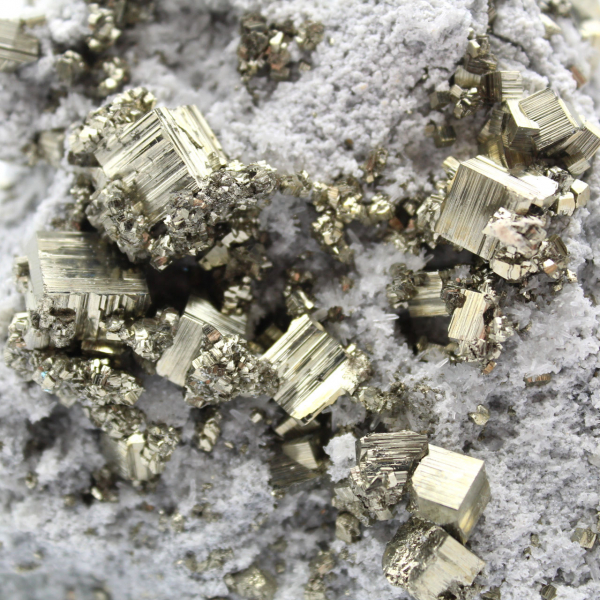 Pyrite on matrix with calcite and quartz