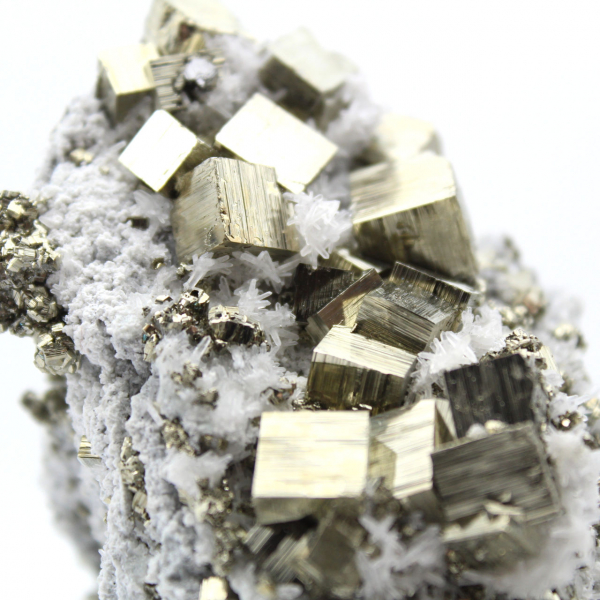 Pyrite on matrix with calcite and quartz