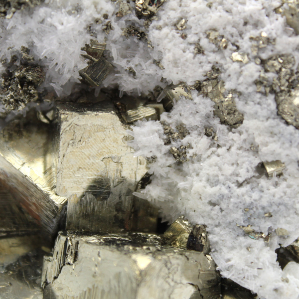 Pyrite on matrix with calcite and quartz