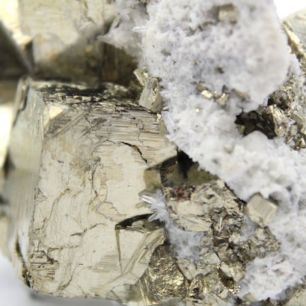 Pyrite on matrix with calcite and quartz