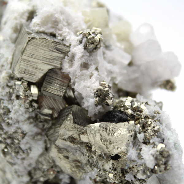 Pyrite on matrix with calcite and quartz