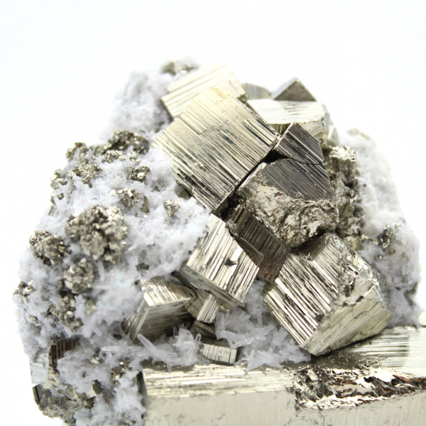 Large pyrite cube with quartz crystals