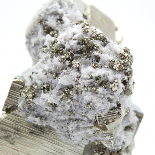 Large pyrite cube with quartz crystals