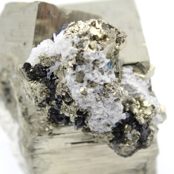 Large pyrite cube with quartz calcite