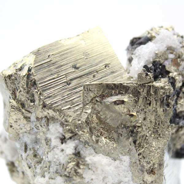 Large pyrite cube with quartz calcite