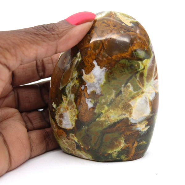 Polished green opal stone