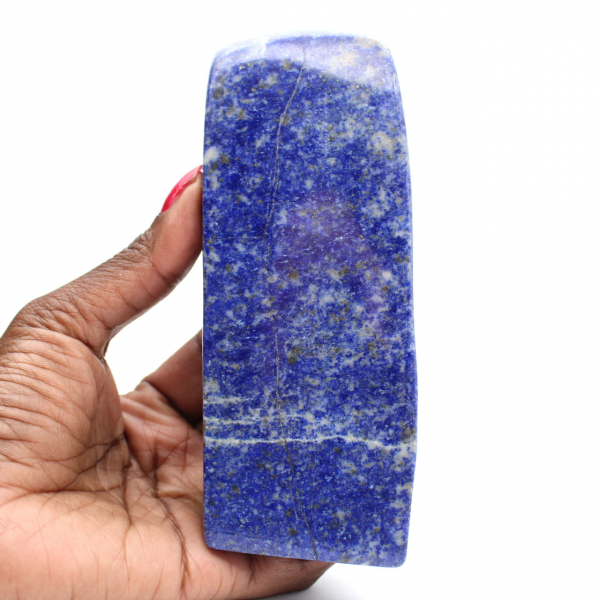 Polished blue lapis lazuli stone from Afghanistan Polished blue lapis lazuli stone from Afghanistan