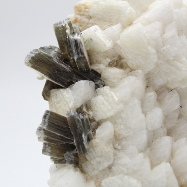 Small specimen of mica on white quartz