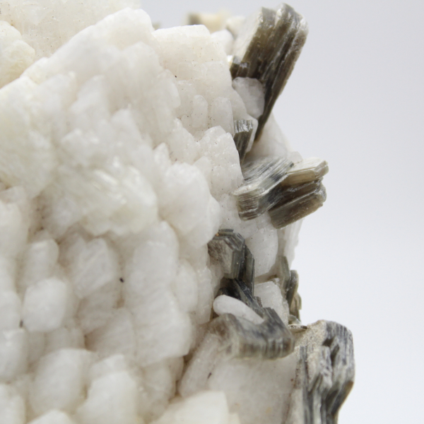 Small specimen of mica on white quartz