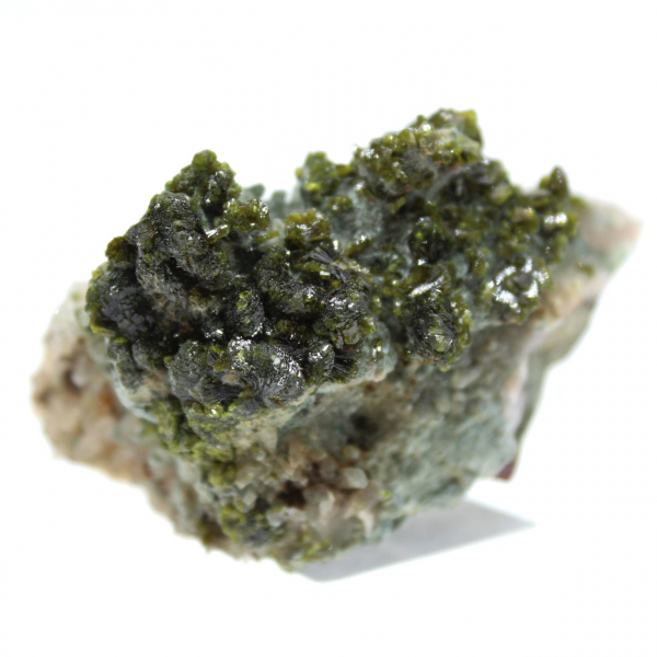 Moroccan epidote on beige matrix of origin