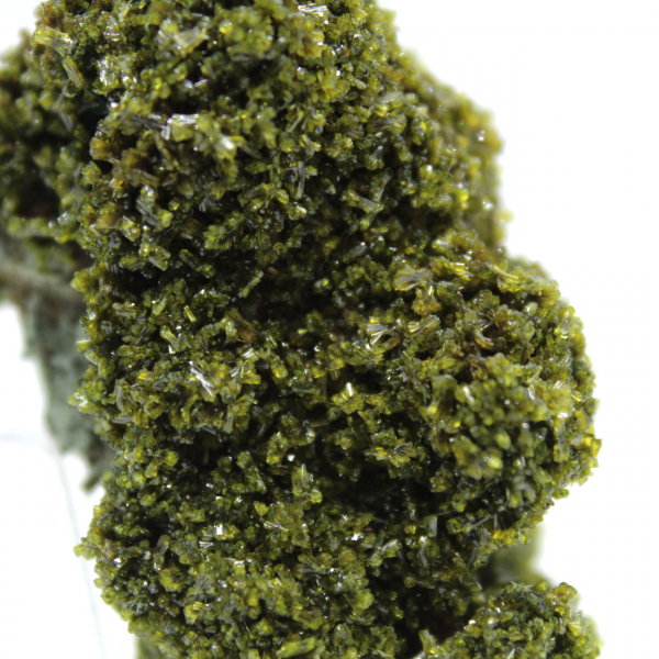 Epidote crystals from Morocco on beige matrix