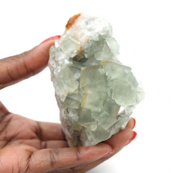 Raw green fluorite stone: Crystallized sample on rock