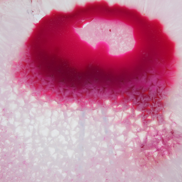 Decorative slice of pink-tinted agate