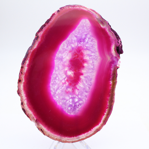 Polished slice of dyed pink agate