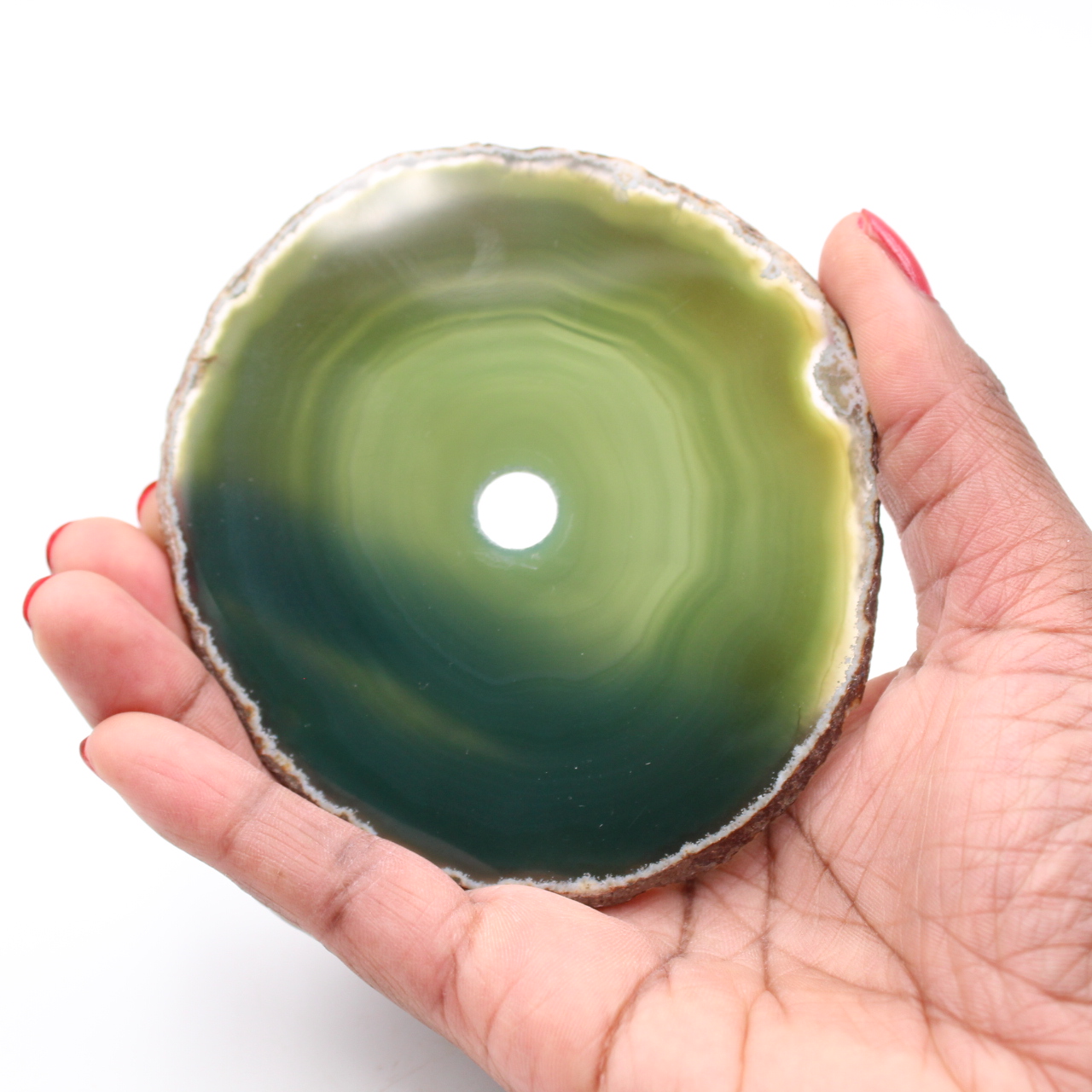 Polished and pierced agate from Brazil