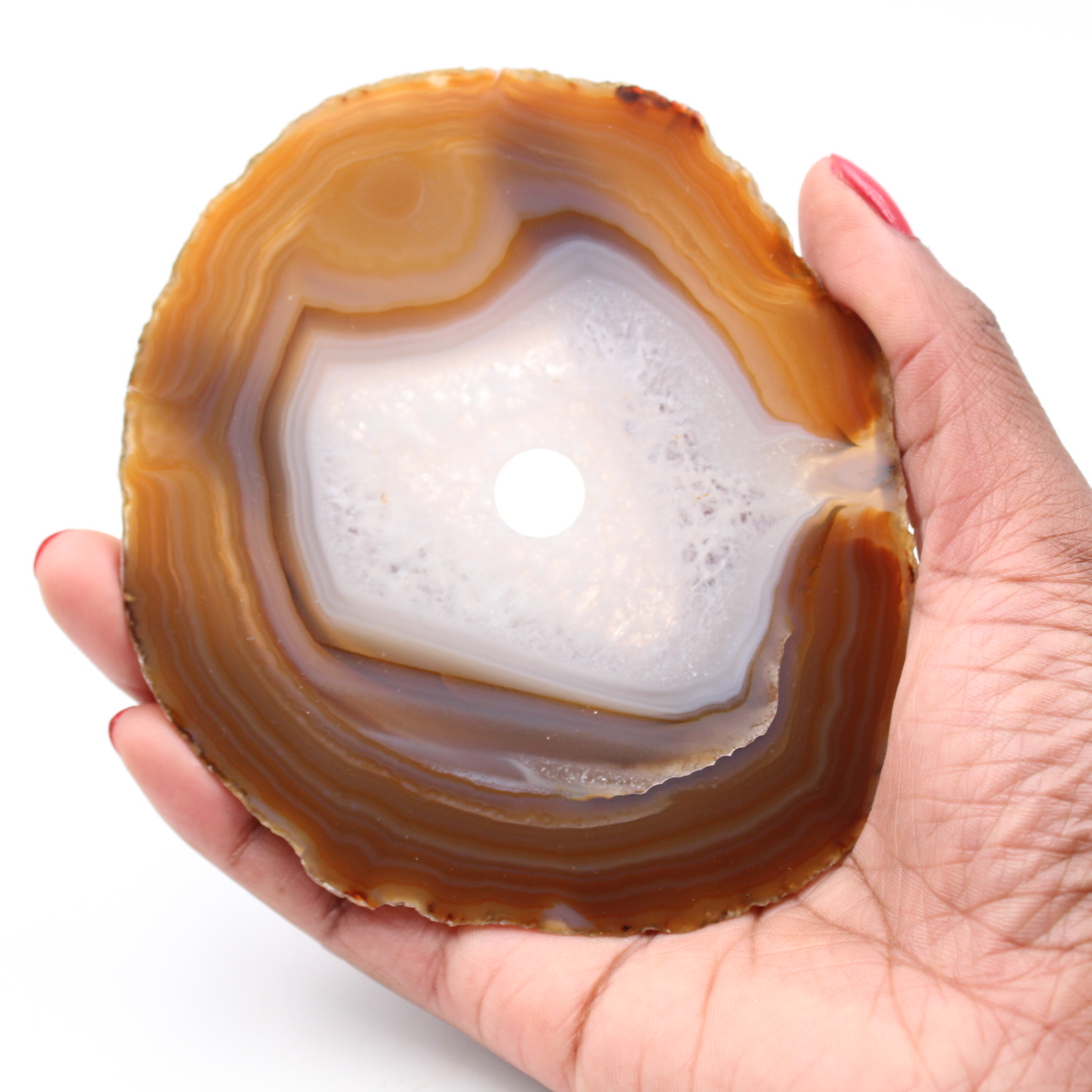 Polished and pierced agate from Brazil
