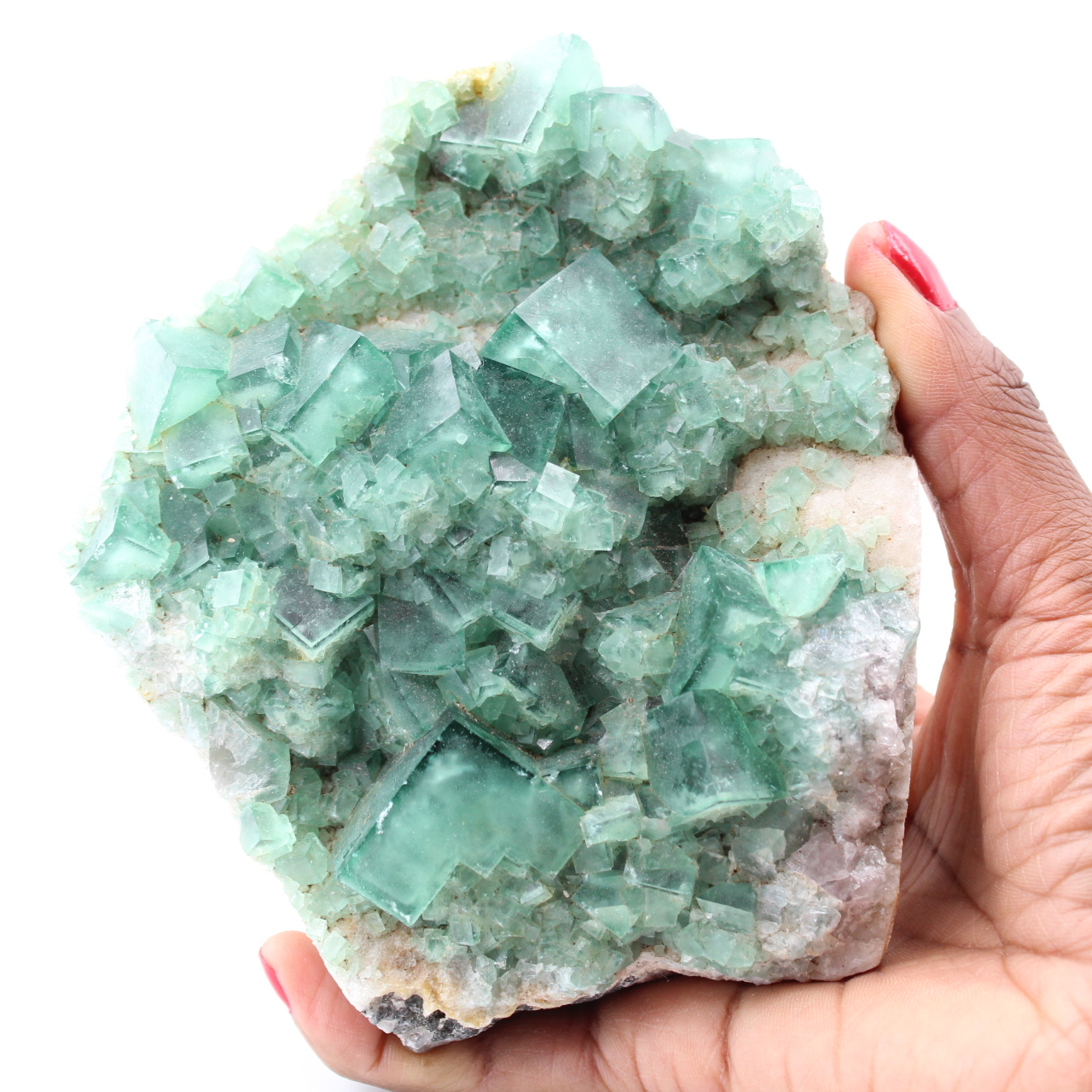 Cubic crystals of green fluorite on massive fluorite