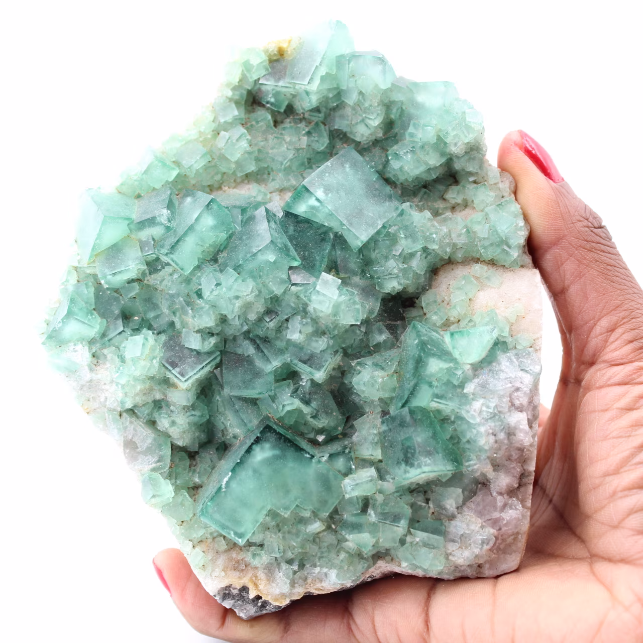 Cubic crystals of green fluorite on massive fluorite