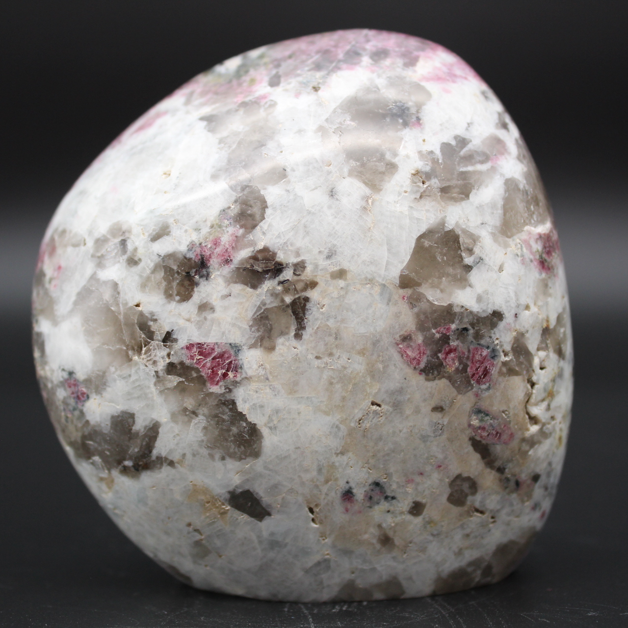 Free-form stone with inclusion of Tourmaline