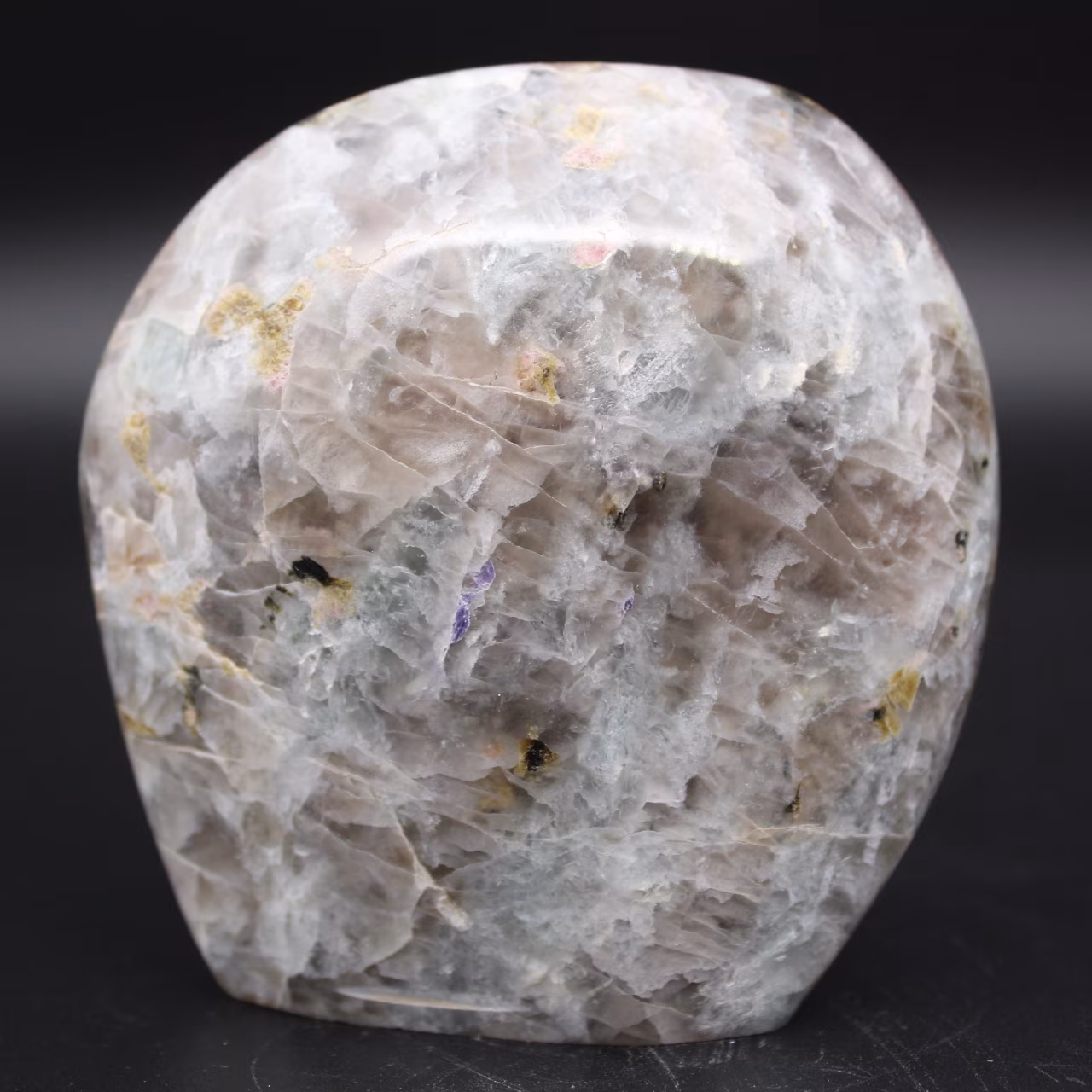 Free-form stone with inclusion of Tourmaline