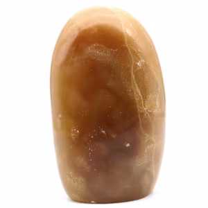 Polished natural honey calcite