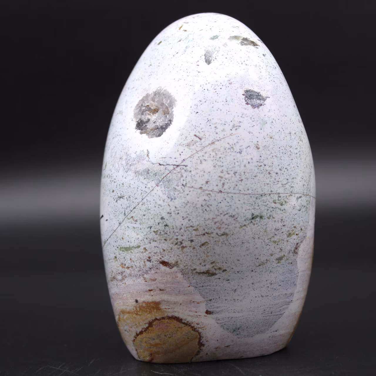 Polished natural polychrome jasper block