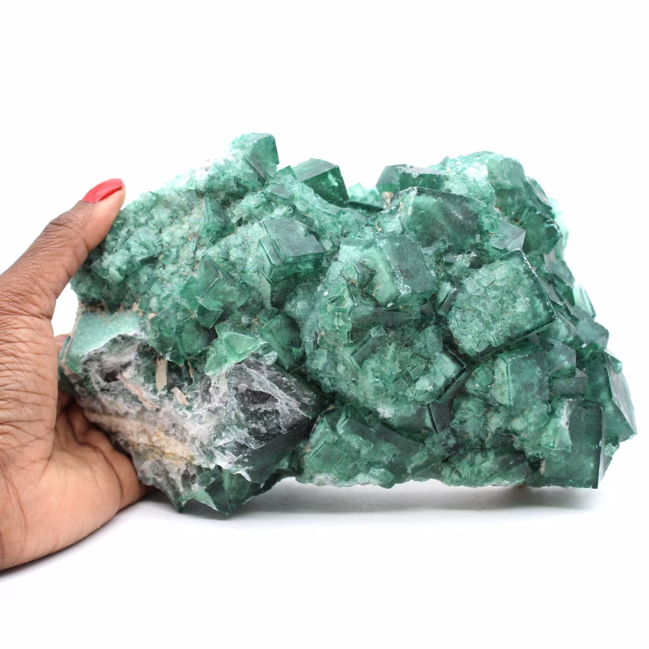 Cubic crystals of fluorite on matrix 2.5 kilo