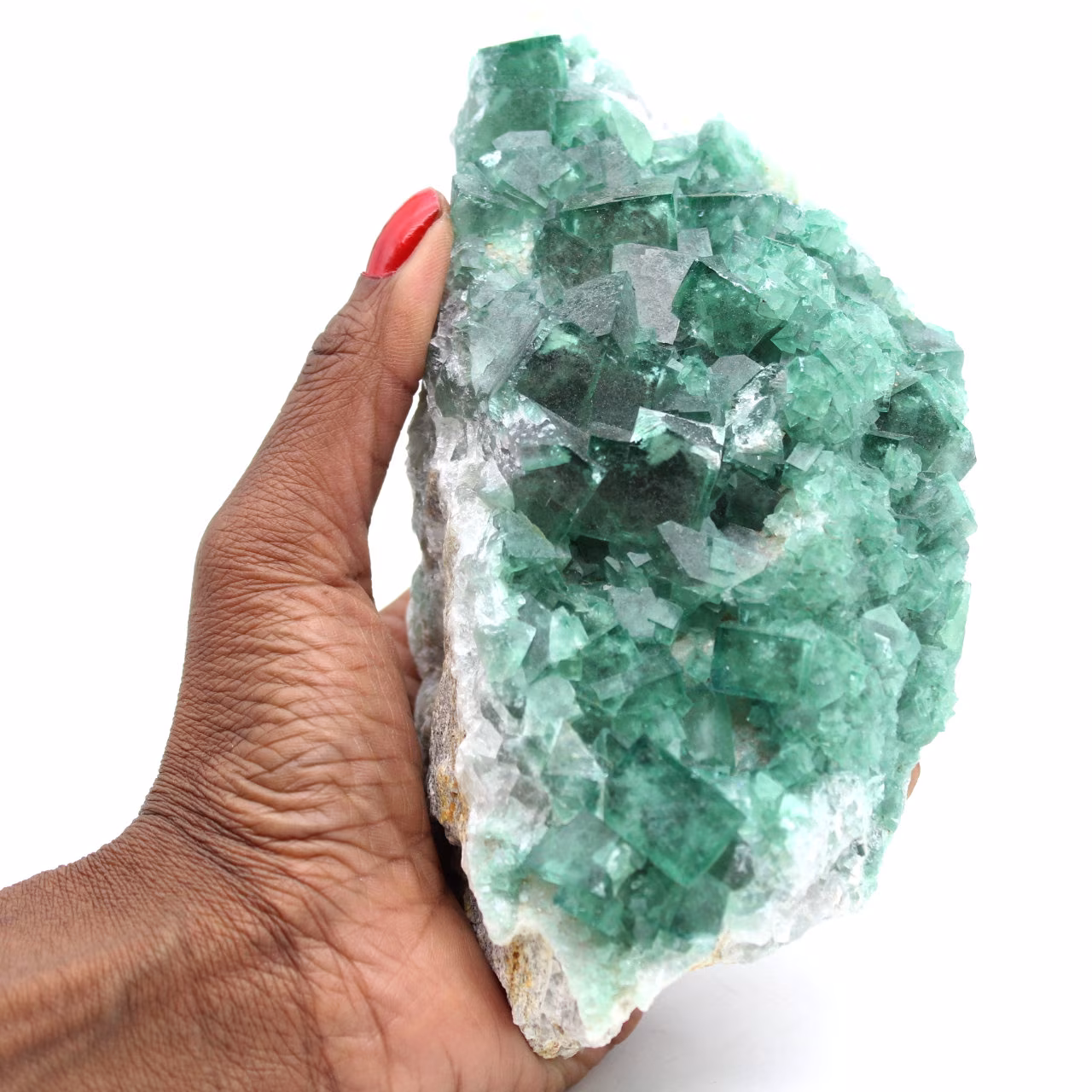 Raw green fluorite in crystals on matrix