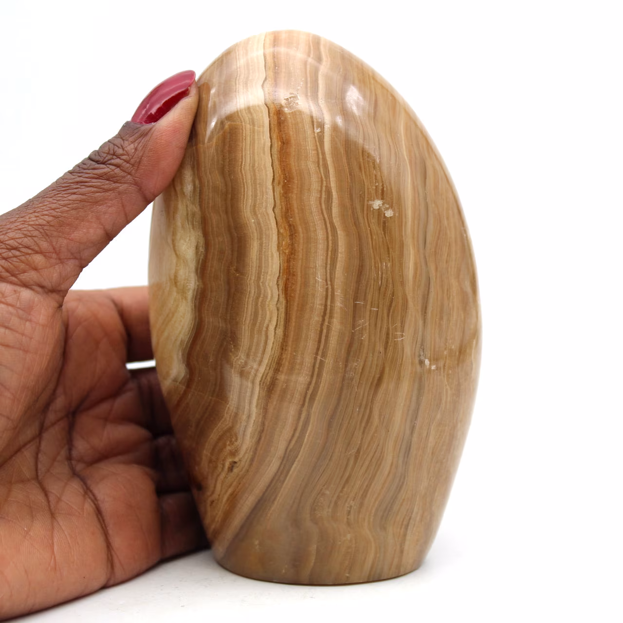Polished freeform honey calcite