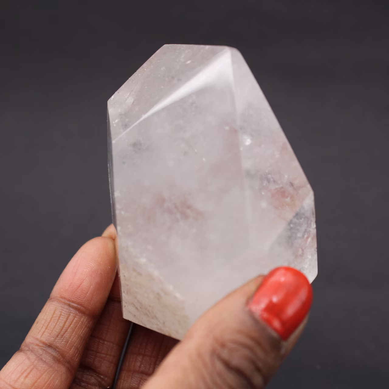 Quartz crystal prism with inclusion