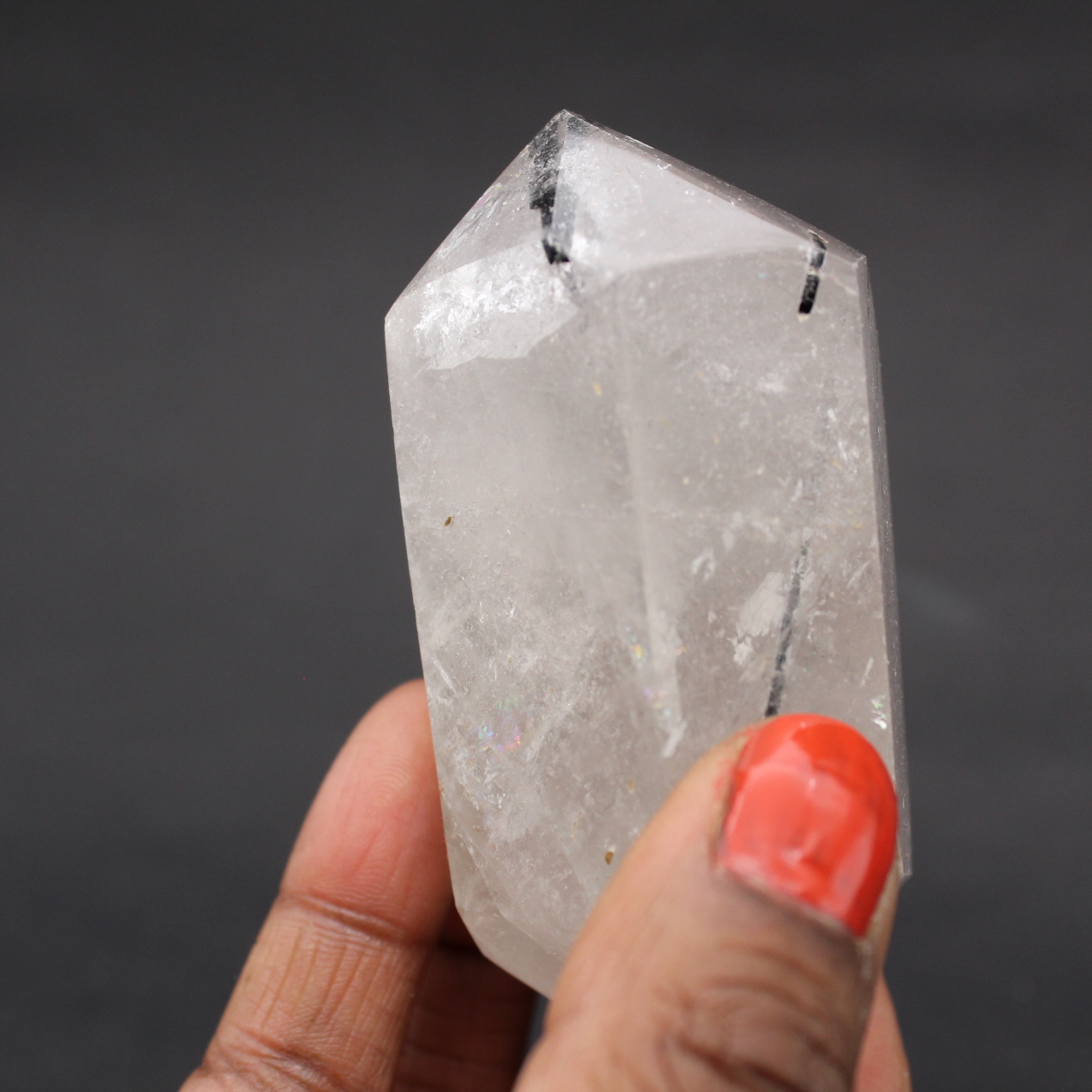 Bitterminated crystal with inclusion of tourmaline crystals