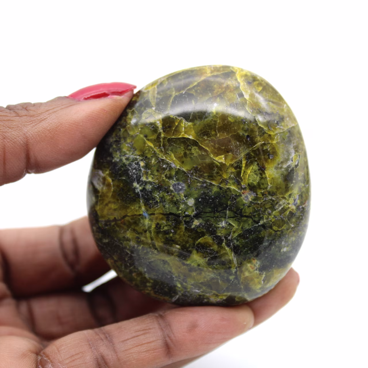 Polished pebble in green opal