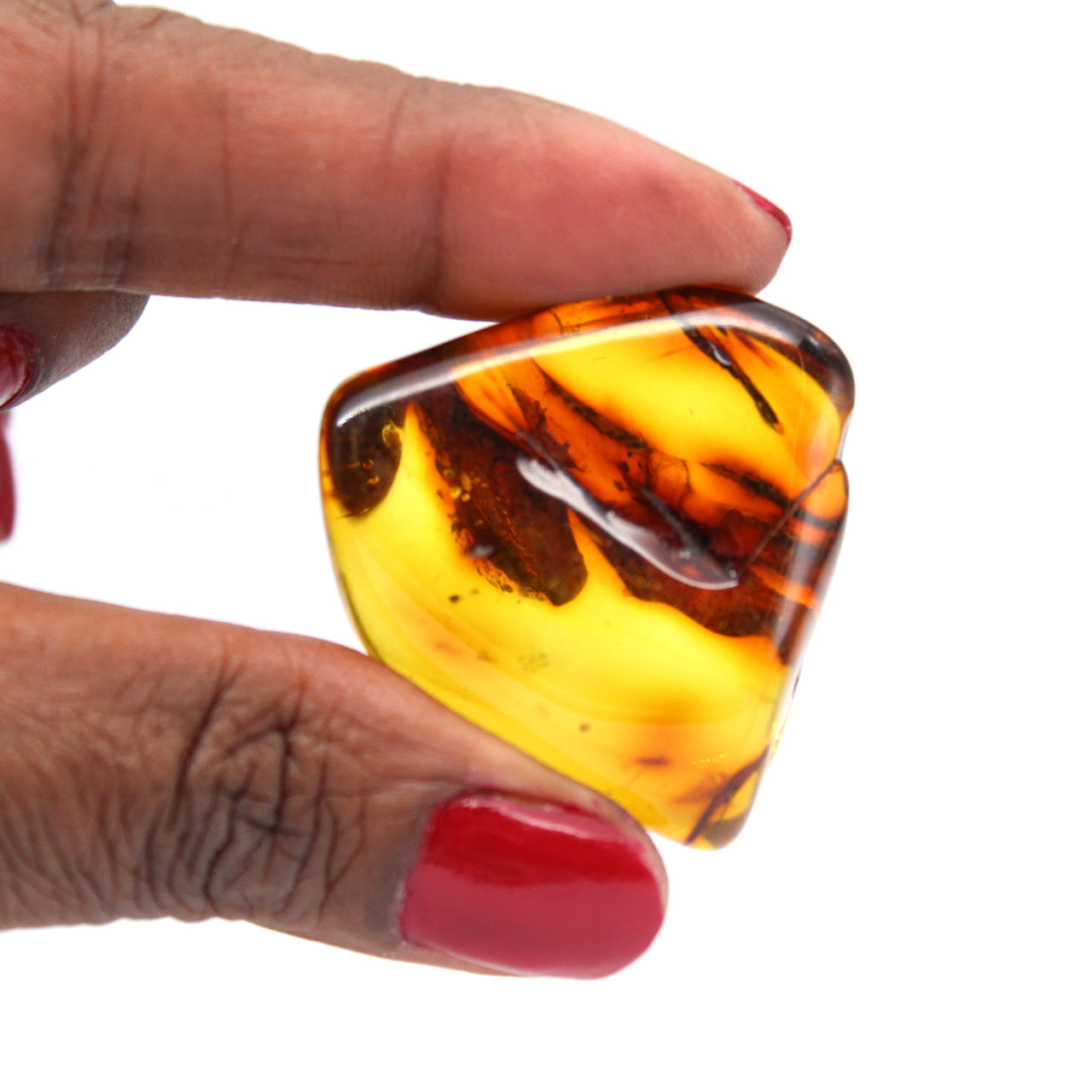 Polished amber pebble