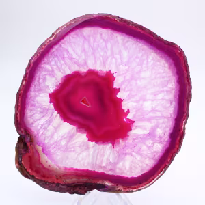 Decorative slice of pink-tinted agate