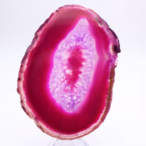 Polished slice of dyed pink agate