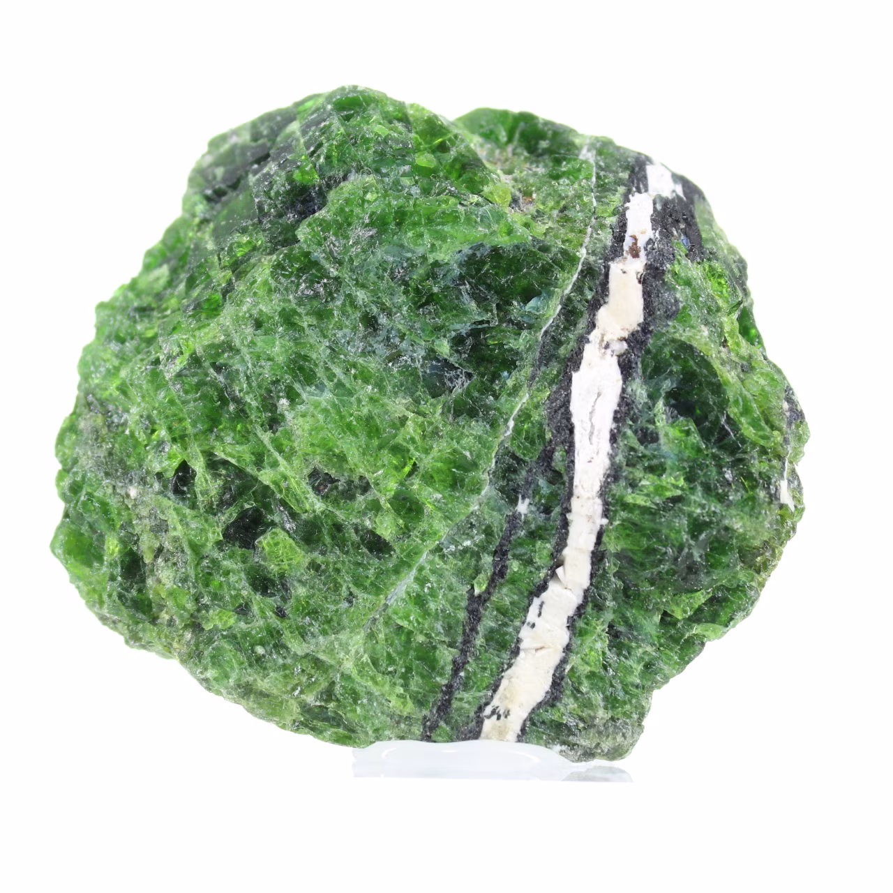 Raw Finnish chromediopside on a base, green stone 135 g