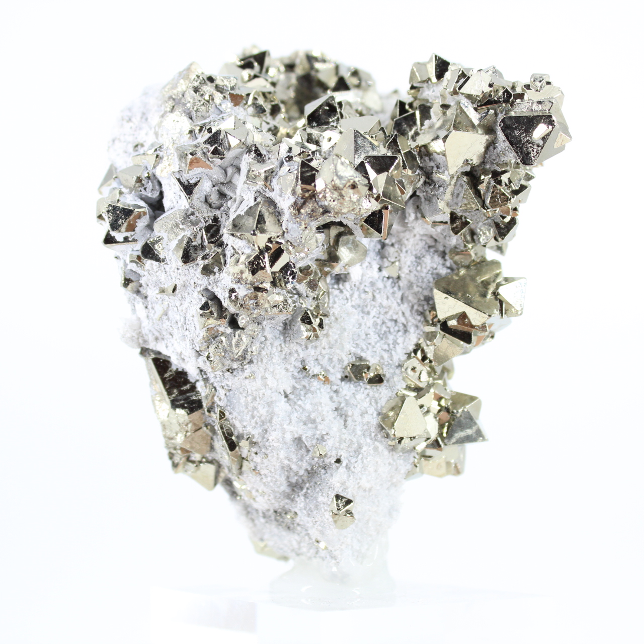 Natural octahedral pyrite crystals from Peru on a base