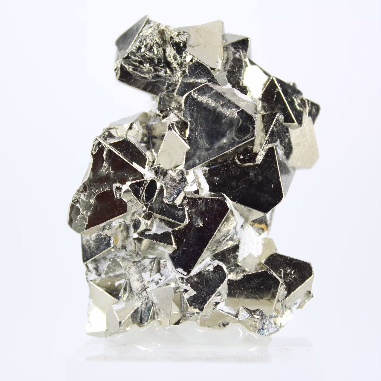 Pyrite from Peru, octahedral crystals on an acrylic base