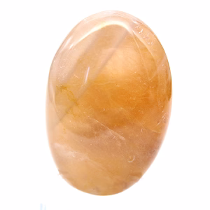 Yellow quartz pebble from Madagascar with rounded shapes