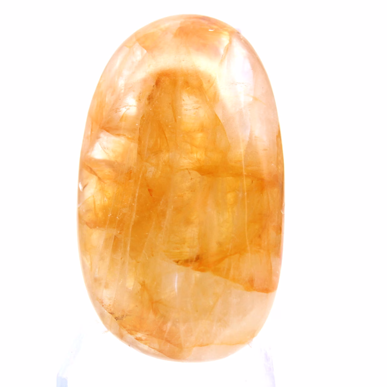 Polished yellow quartz pebble from Madagascar for display cabinets