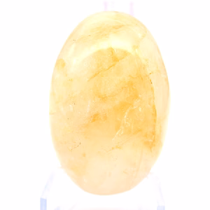 Yellow quartz from Madagascar as a polished collector's pebble