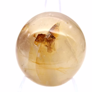 Yellow quartz pebble from Madagascar, polished natural stone