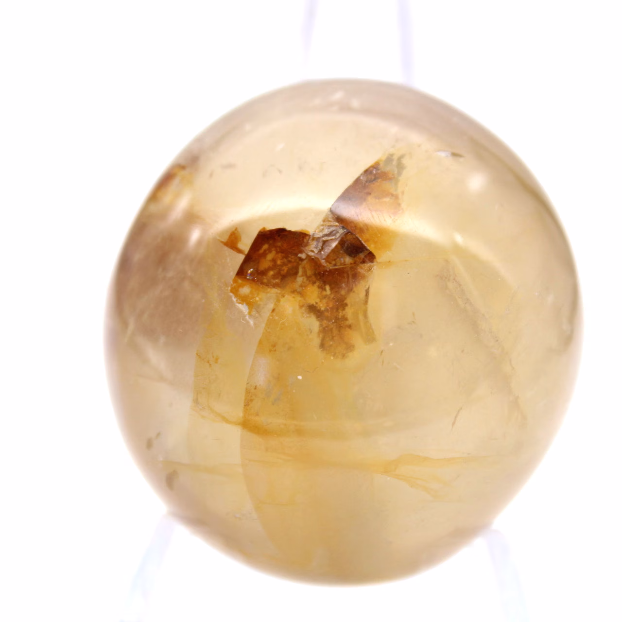 Yellow quartz pebble from Madagascar, polished natural stone